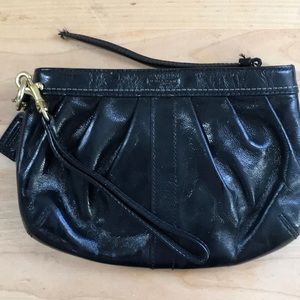 Black coach wristlet with blue satin interior